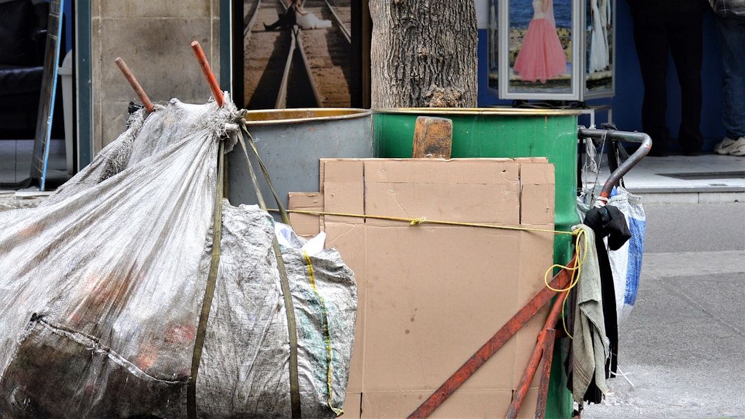 white plastic bag on green cabinet