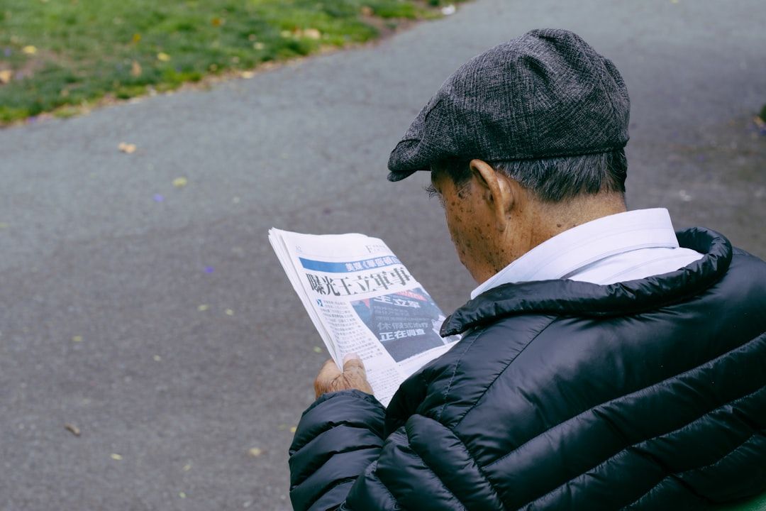 newspapers are stacked on top of each other